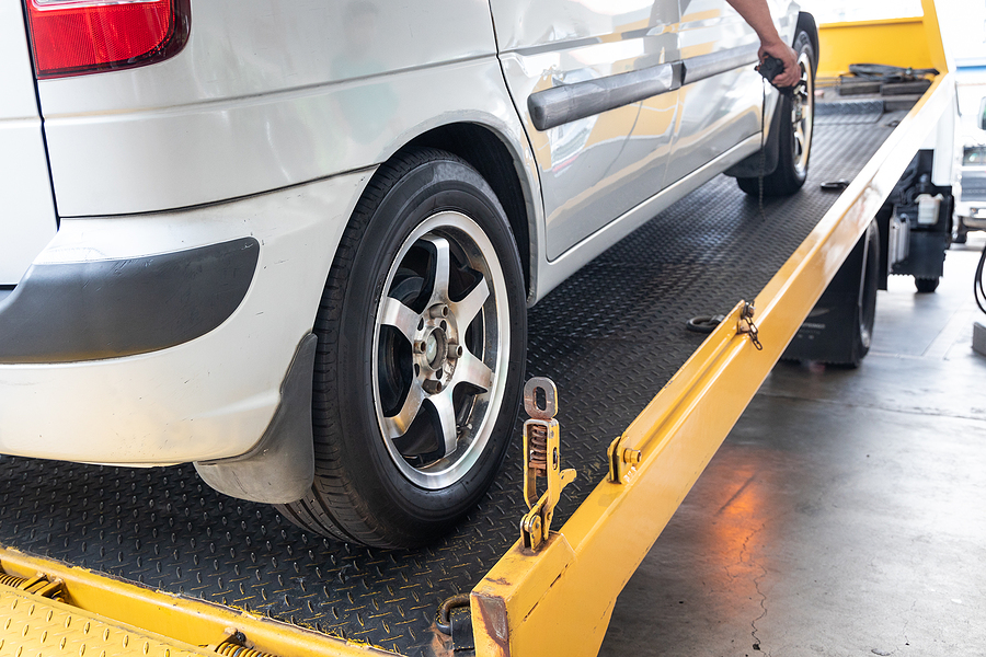 unloading the towed car